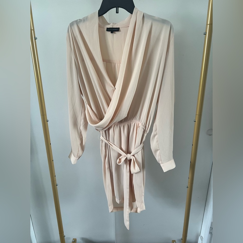 Large long sleeve Peach romper with tie waist. Used - in good condition